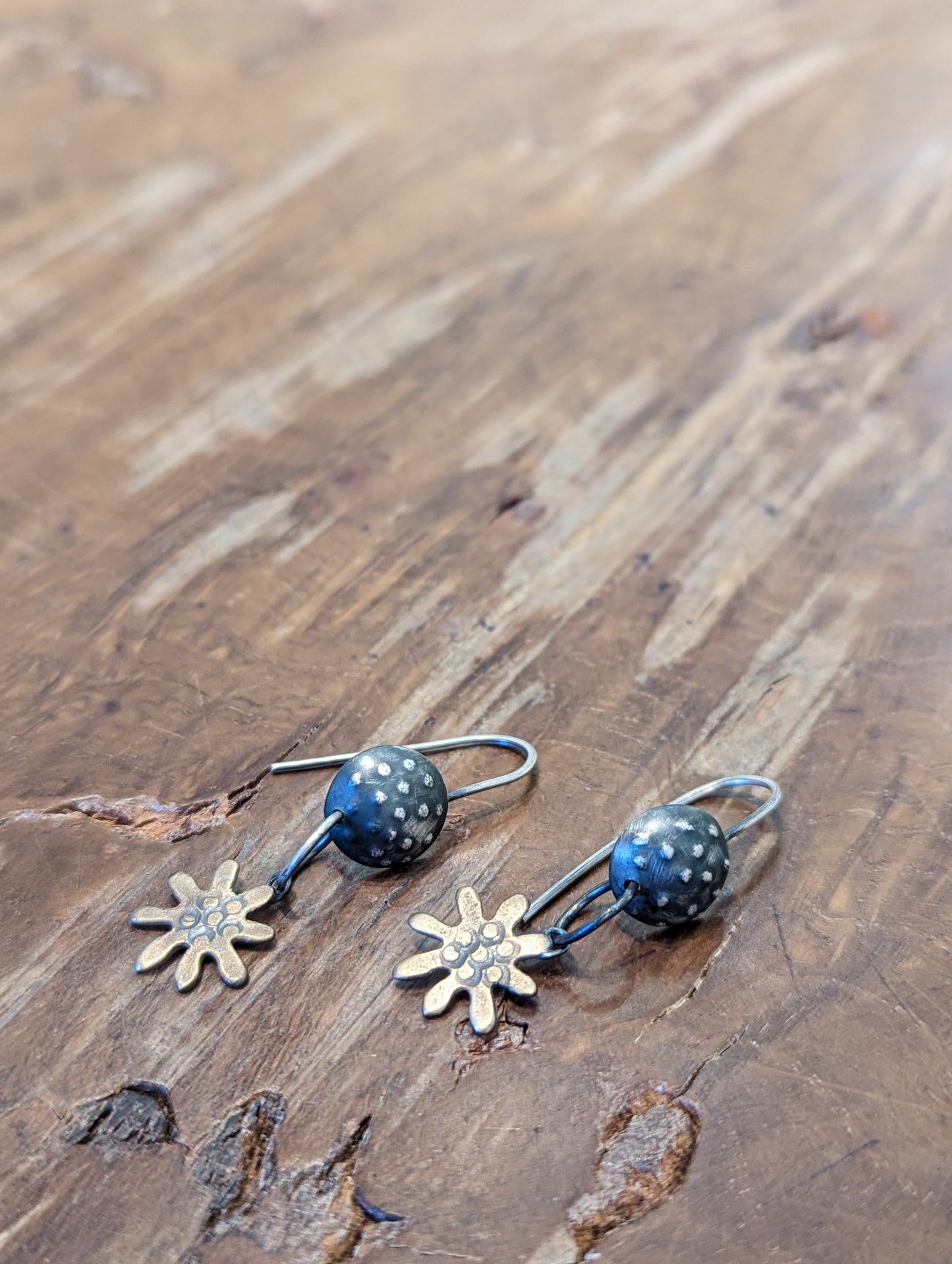 Frances Noon - Silver Earrings with Bronze Flowers.