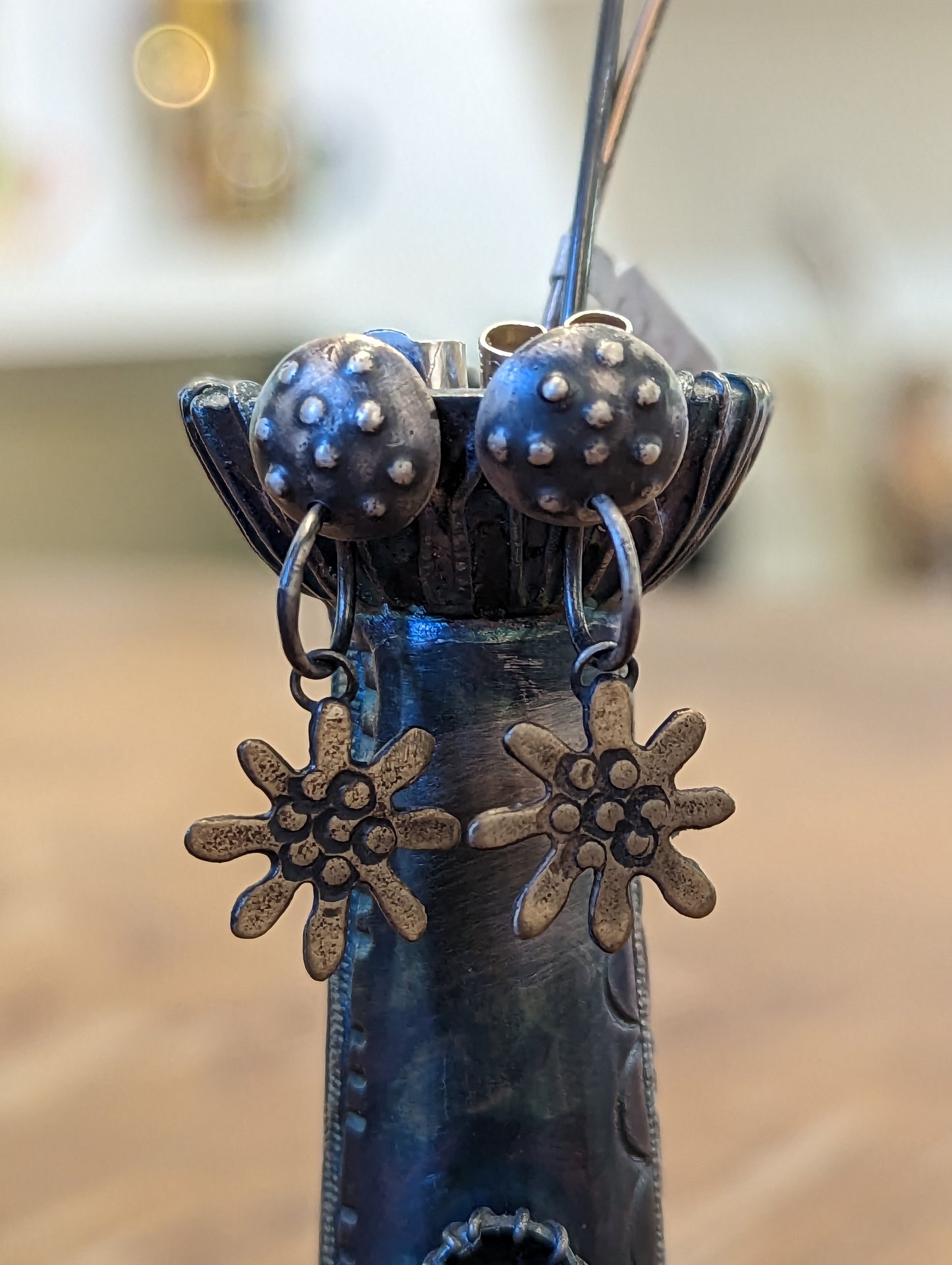 Frances Noon - Silver Earrings with Bronze Flowers.